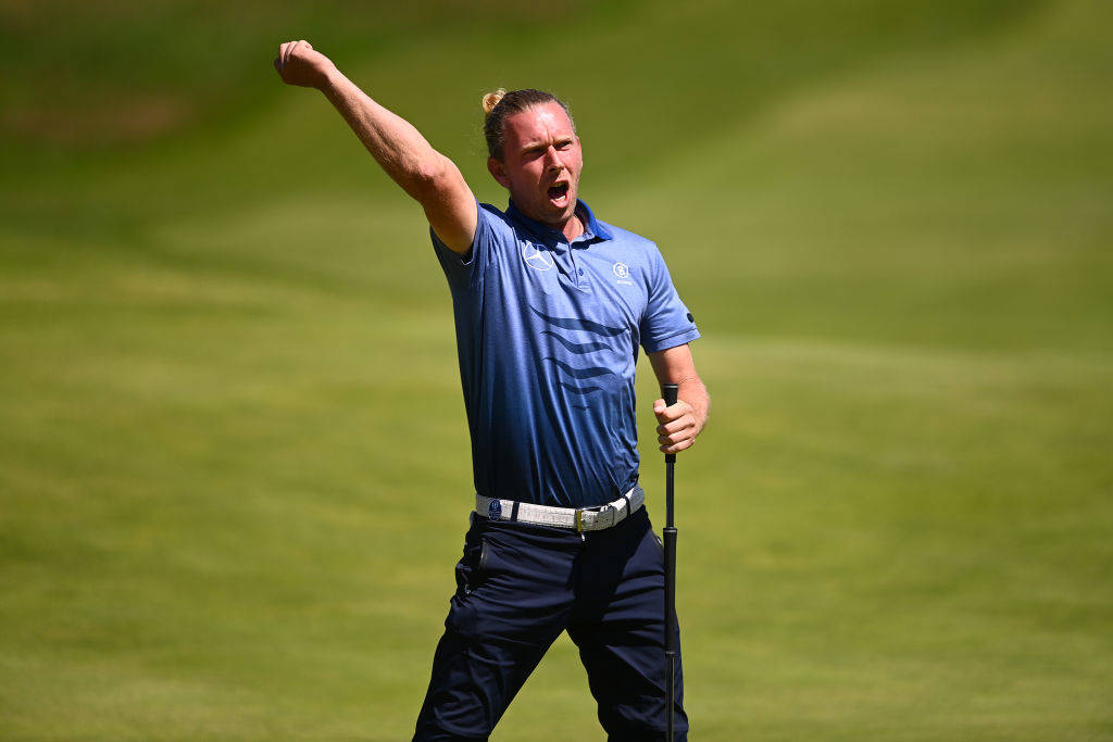 Marcel Siem celebrates with the crowd at Royal St George's
